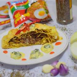 minced beef and mie wellington with mushroom and spinach sauce