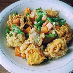 Noodle ball and kakap fillet with egg salted sauce