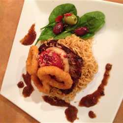 Indomie beef steak stack with calamari and black pepper sauce