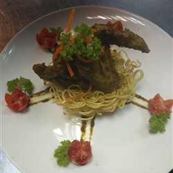 Chiken wingis with noodle exotic sauce