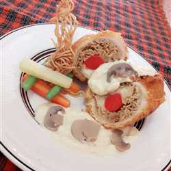 Indomie chicken roll with mushroom sauce